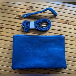 Blue with gold colored hardware wristlet or strap purse